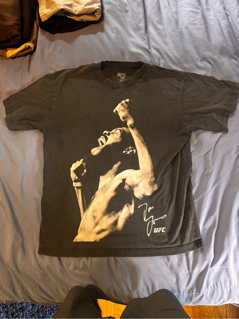 UFC Black Short-Sleeve Graphic Tee with Gold Athlete Print